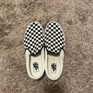Checkerboard slip on vans
